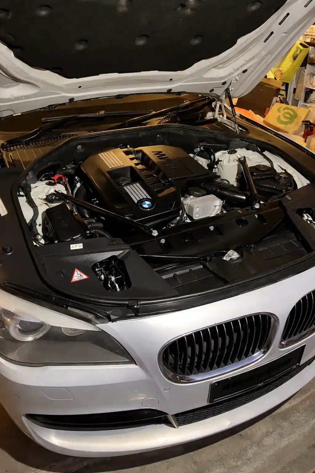 BMW engine bay in garage setting_3_11zon_11zon